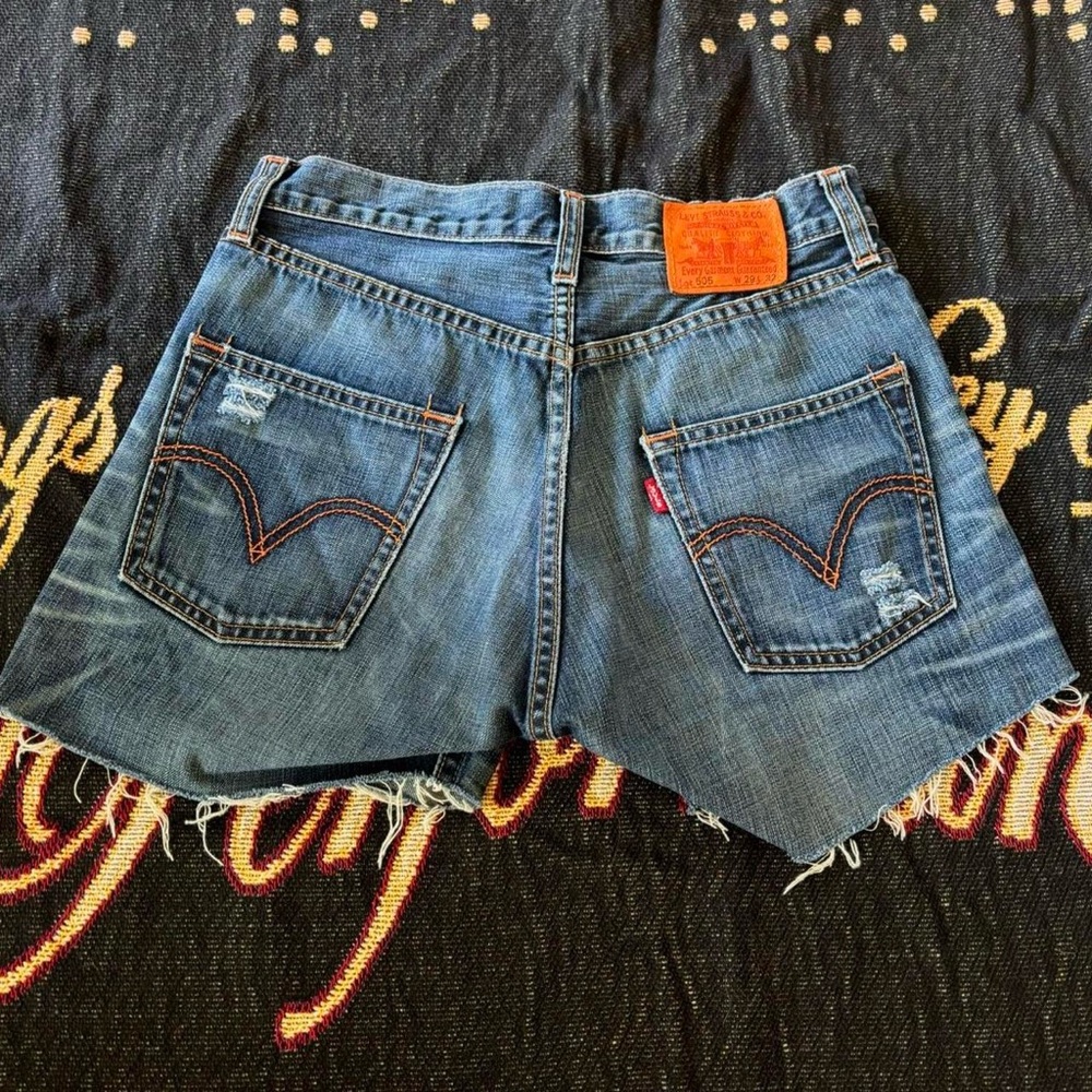Levi's 501 distressed denim jean shorts orange tag